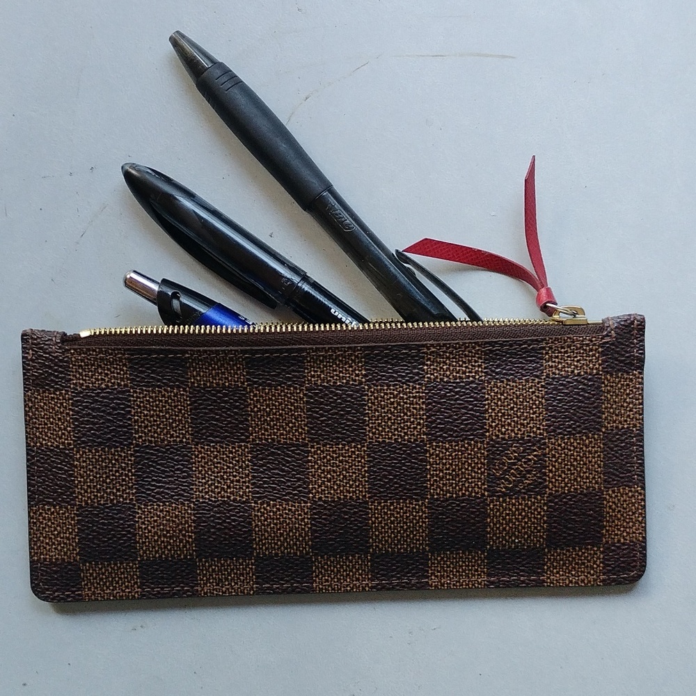 Louis Vuitton authentic Josephine wallet insert in the Damier Ebene coated canva